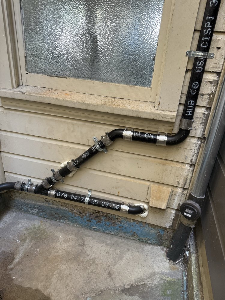 Exterior utility line installation and routing on a Fresno home